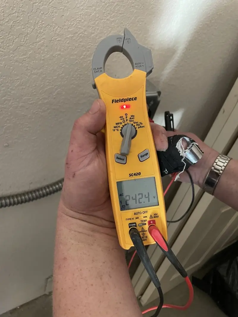 Voltage testing with clamp meter during Generator Installation in Mansfield